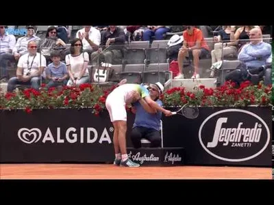 Zverev gives a hug to a line judge against Federer in Rome