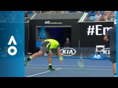 Groth destroys his racquet after the last serve of his career