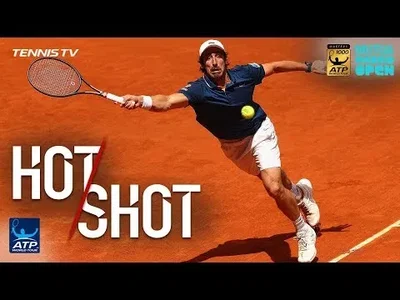 Perfect passing shot from Cuevas against Isner in Madrid