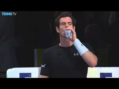 Murray cuts his hairs during his match against Nadal in London